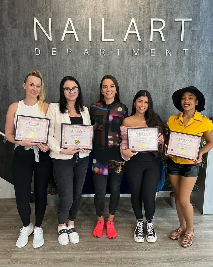 Students with course certificates alongside Siranush Ambartsumian at Nail Art Department