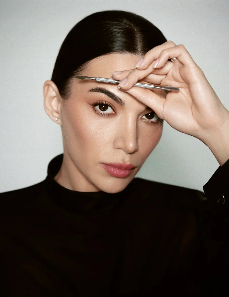 Siranush Ambartsumian holding a precision manicure instrument