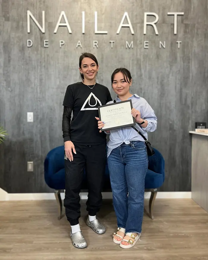 Student completing Dual Forms nail extension training